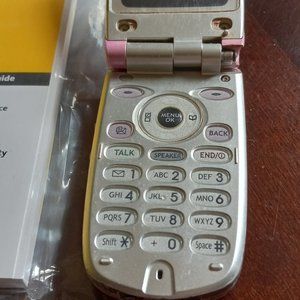 Sanyo pink flip phone with car charger. 12$ obo